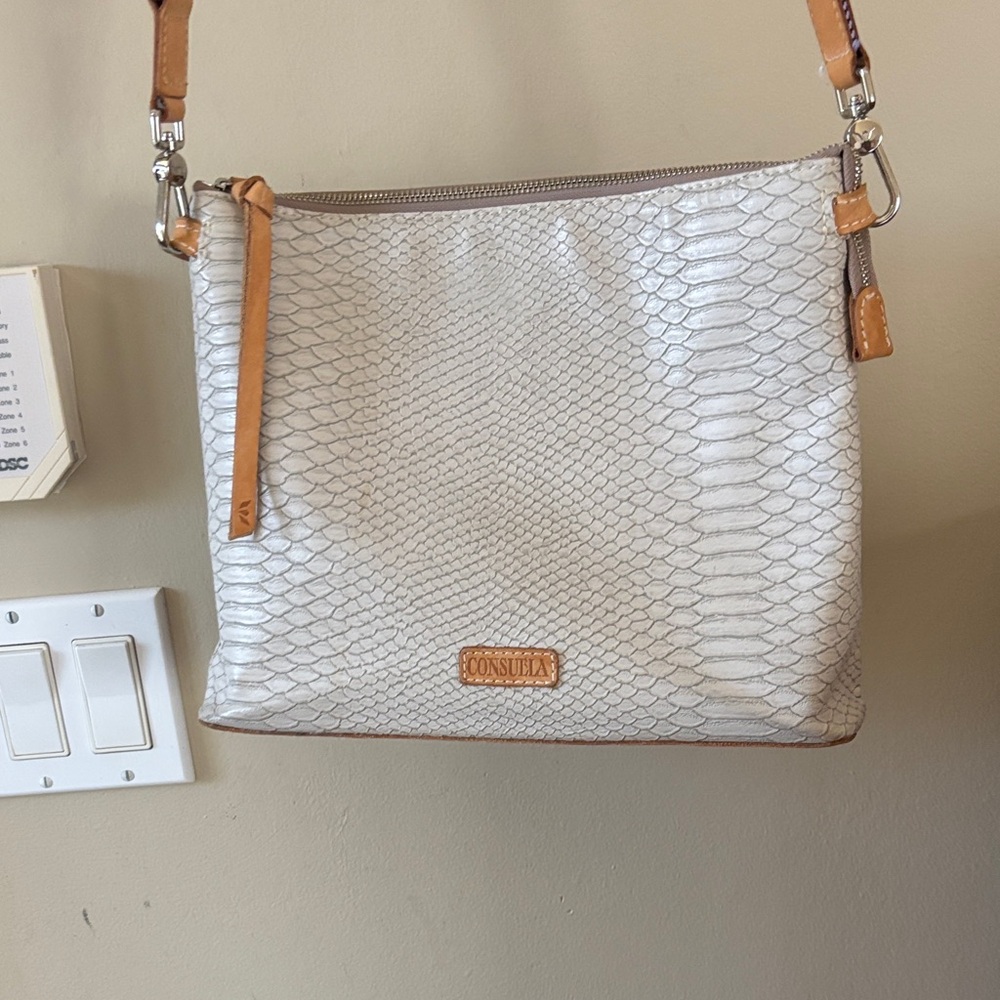 Consuela Thunderbird White Embossed Crossbody with Tan Trim bag